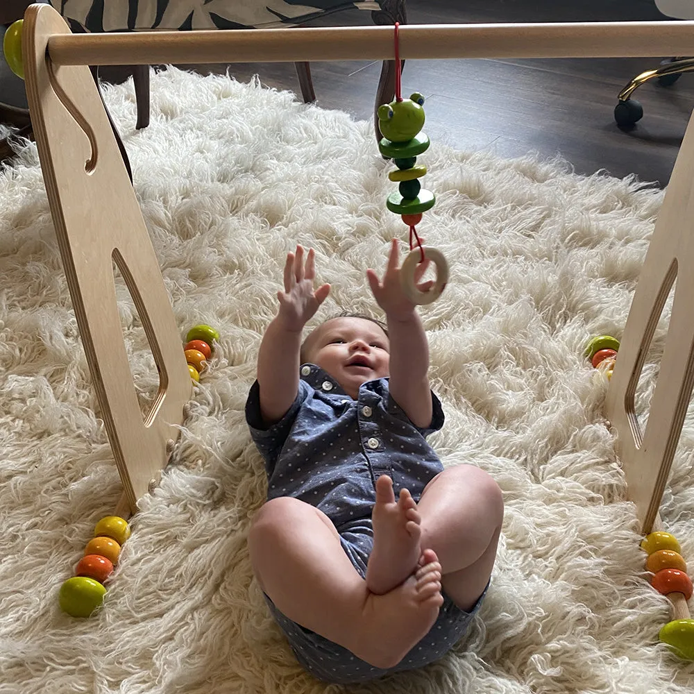 Adjustable Wooden Infant Play Gym with Frog Pull Toy | Perfect for Tummy Time & Floor Play